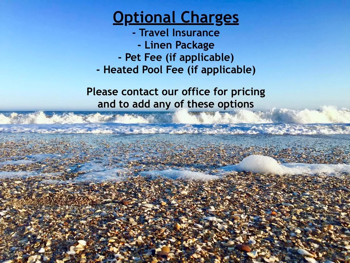 A wide, sandy beach with waves crashing on the shore, dotted with seashells and pebbles. The ocean stretches into the distance beneath an open sky, creating a tranquil and inviting atmosphere for beach activities.